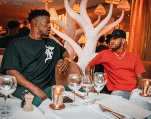 Jimmy Butler tenta convencer Nikola Jovic a torcer pela Seleção Brasileira