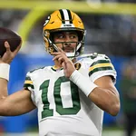 NFL: O amor est&aacute; no ar! Contra os Lions, Love decide para os Packers