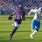 NFL: Que surra! Lamar Jackson tem atua&ccedil;&atilde;o esmagadora contra os Lions em dia de recordes